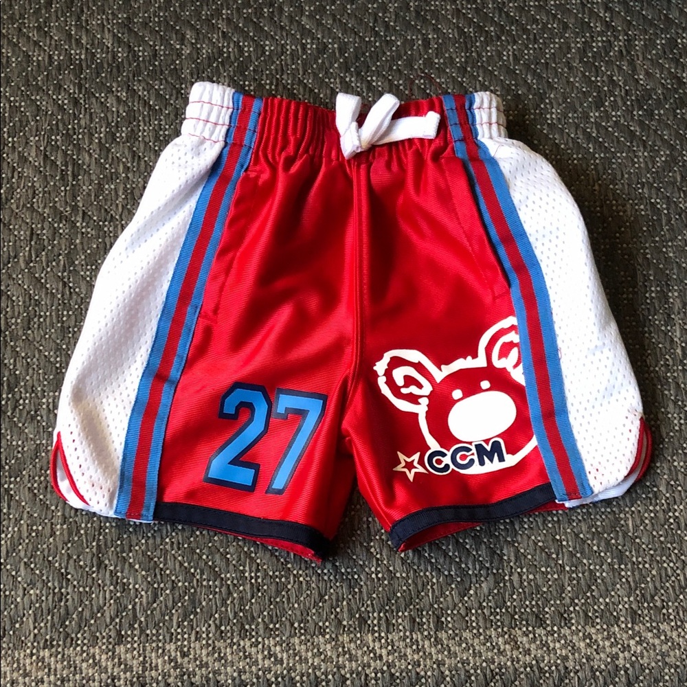 CCM Red Kids Athletic Shorts with Blue Trim and White Side Panels